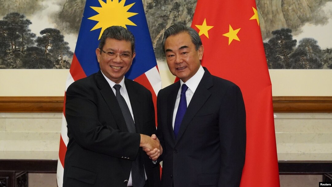 Quan chức ngoại giao Malaysia và Trung Quốc gặp nhau hôm 12/9.