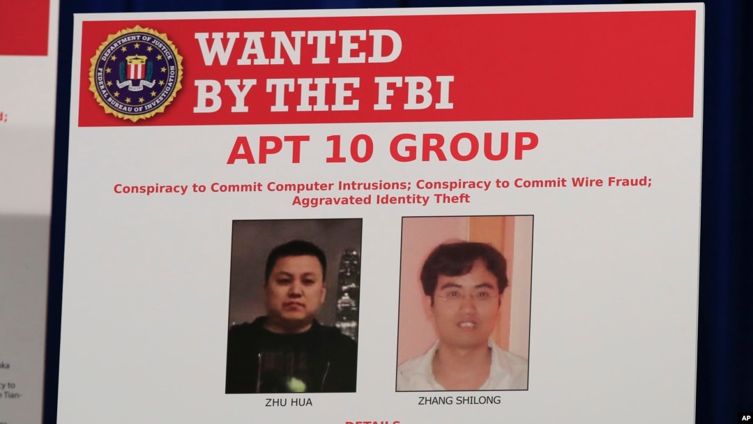 Ảnh hai tin tặc Trung Quốc bị FBI truy lùng vào năm 2018.